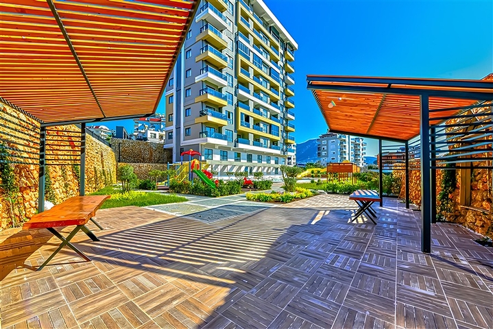 Нова квартира біля моря плануванням 1+1 в районі Тосмур