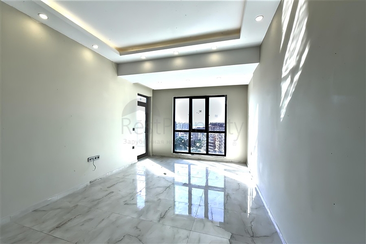 Нова квартира біля моря плануванням 1+1 в районі Тосмур