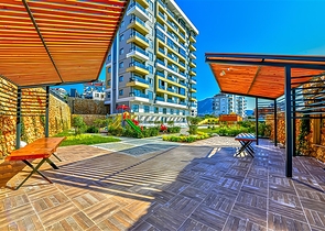 Нова квартира біля моря плануванням 1+1 в районі Тосмур