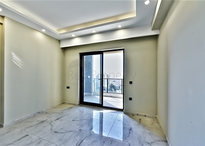 Нова квартира біля моря плануванням 1+1 в районі Тосмур