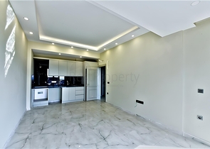 Нова квартира біля моря плануванням 1+1 в районі Тосмур