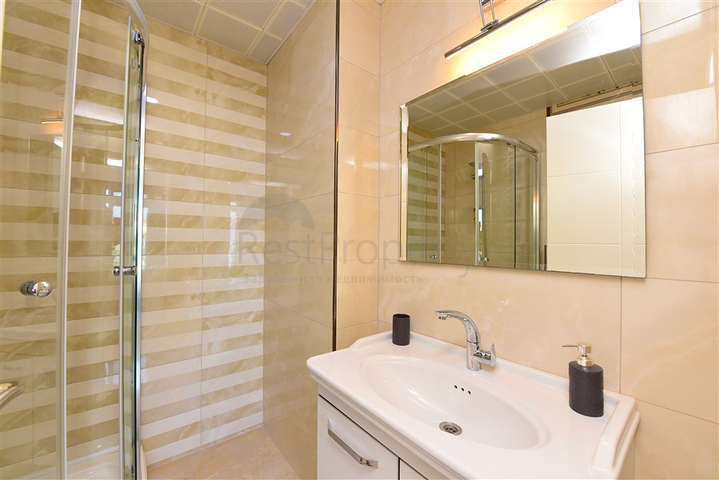 Простора пентхаус 3 + 1 в районі Махмутлар