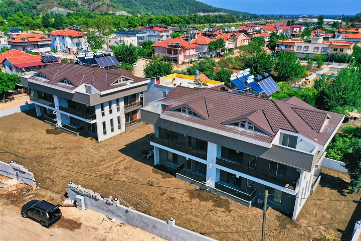 Квартири планування 2 + 1 і 5 + 1 в районі Кемер - Анталія 