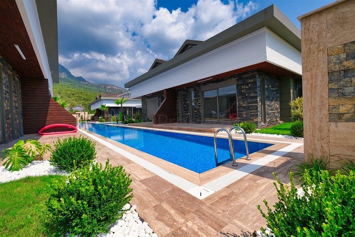  Таунхаус планування 3 + 1 в районі Кемер-Анталія 