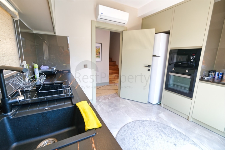  Таунхаус планування 3 + 1 в районі Кемер-Анталія 