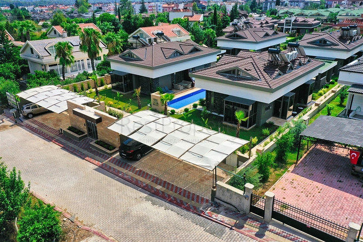  Таунхаус планування 3 + 1 в районі Кемер-Анталія 