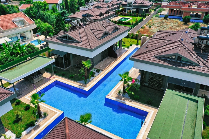  Таунхаус планування 3 + 1 в районі Кемер-Анталія 