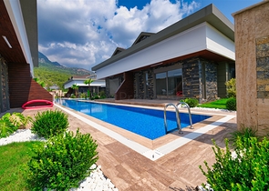  Таунхаус планування 3 + 1 в районі Кемер-Анталія 