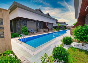  Таунхаус планування 3 + 1 в районі Кемер-Анталія 