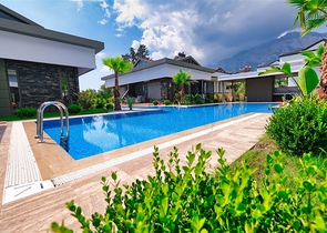  Таунхаус планування 3 + 1 в районі Кемер-Анталія 