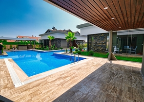  Таунхаус планування 3 + 1 в районі Кемер-Анталія 