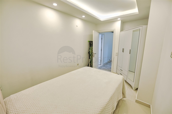 Квартира планування 2 + 1 в мікрорайоні Ерменек - Анталія 