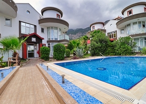 Квартира планування 3 + 2 дуплекс в районі Кемер-Анталія 