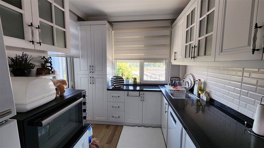 Квартира планування 3 + 1 в мікрорайоні Гюзельбаг - Анталія 