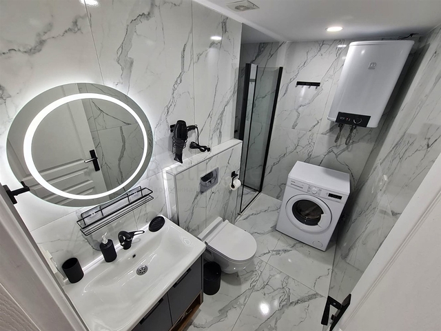 Квартира планування 4 + 1 дуплекс в районі Кемер-Анталія 