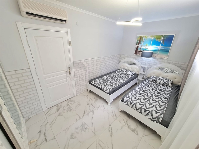 Квартира планування 4 + 1 дуплекс в районі Кемер-Анталія 