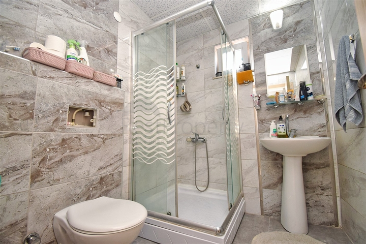 Квартира планування 2 + 1 в мікрорайоні Гебізлі-Анталія 