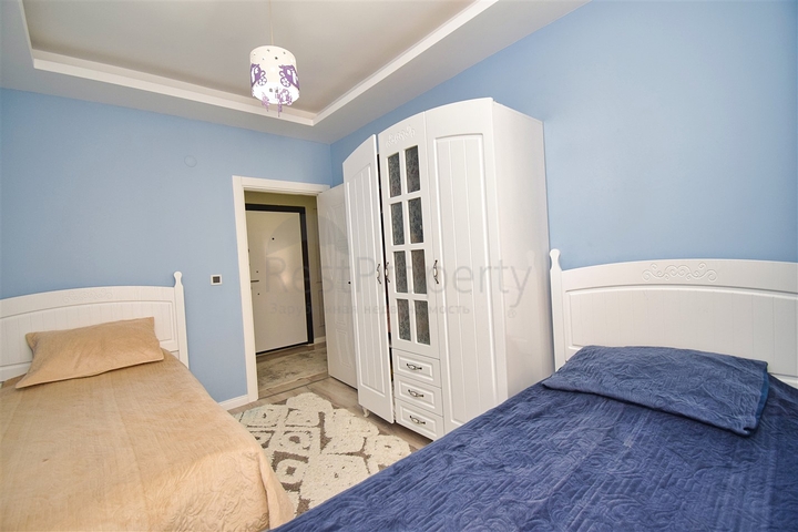 Квартира планування 2 + 1 в мікрорайоні Кизилтопрак - Анталія 