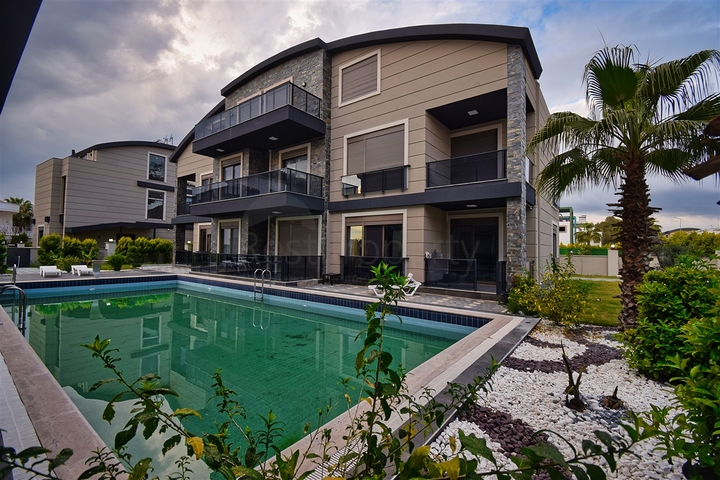 Квартира планування 1 + 1 в престижному комплексі район Белек - Анталія 