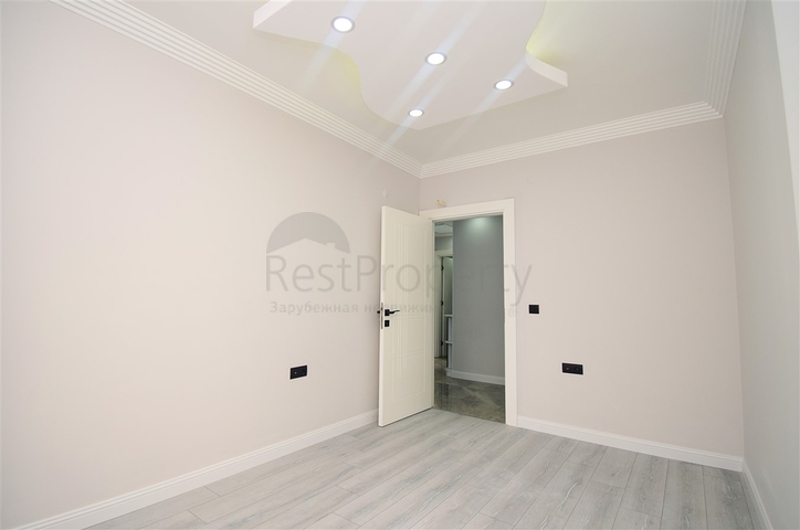 Квартира планування 3 + 1 в мікрорайоні Кизилтопрак - Анталія 