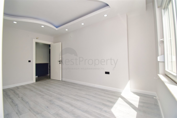 Квартира планування 3 + 1 в мікрорайоні Кизилтопрак - Анталія 