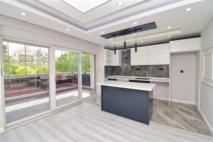 Квартира планування 3 + 1 в мікрорайоні Кизилтопрак - Анталія 