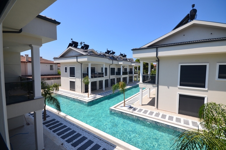 Квартира планування 3 + 1 в районі Фетхіє - Анталія 