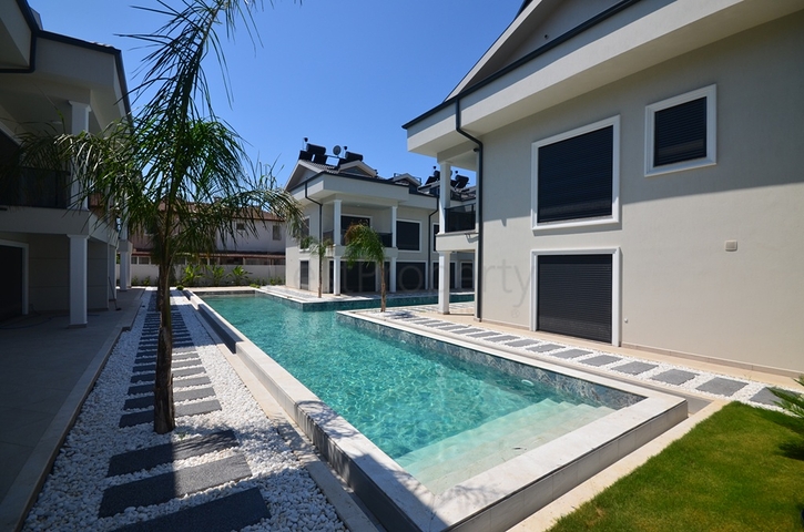 Квартира планування 3 + 1 в районі Фетхіє - Анталія 