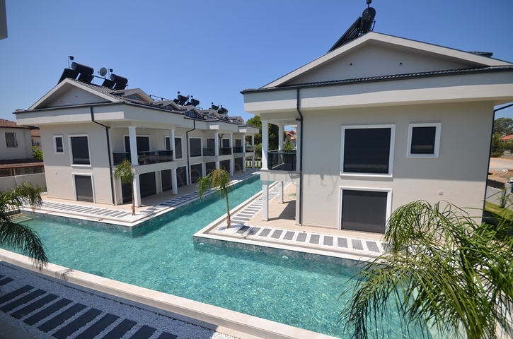 Квартира планування 3 + 1 в районі Фетхіє - Анталія 