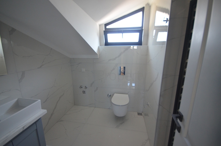 Квартира планування 3 + 1 в районі Фетхіє - Анталія 