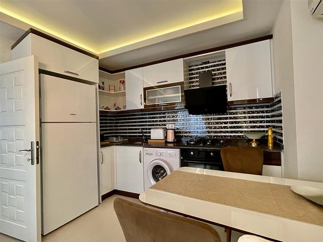 Затишна квартира 1 + 1 в районі Махмутлар