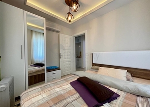 Затишна квартира 1 + 1 в районі Махмутлар