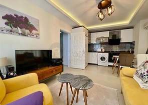 Затишна квартира 1 + 1 в районі Махмутлар