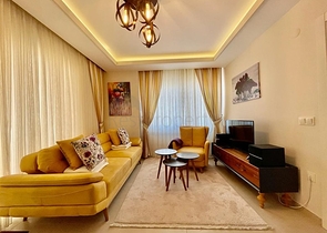 Затишна квартира 1 + 1 в районі Махмутлар