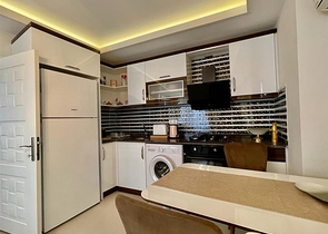 Затишна квартира 1 + 1 в районі Махмутлар