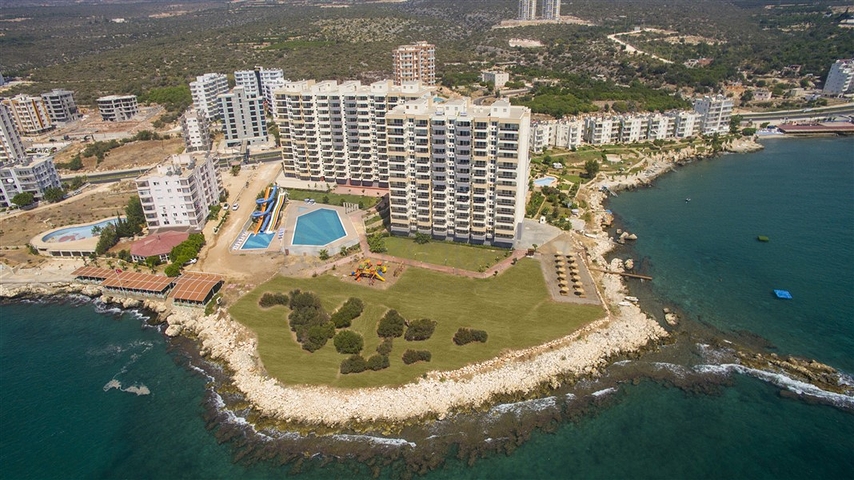 Квартири в готовому комплексі в 110 метрах від моря в районі Аяш-Ердемлі