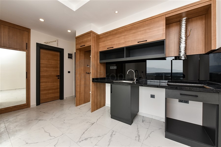 Квартира 1 + 1 в районі Махмутлар