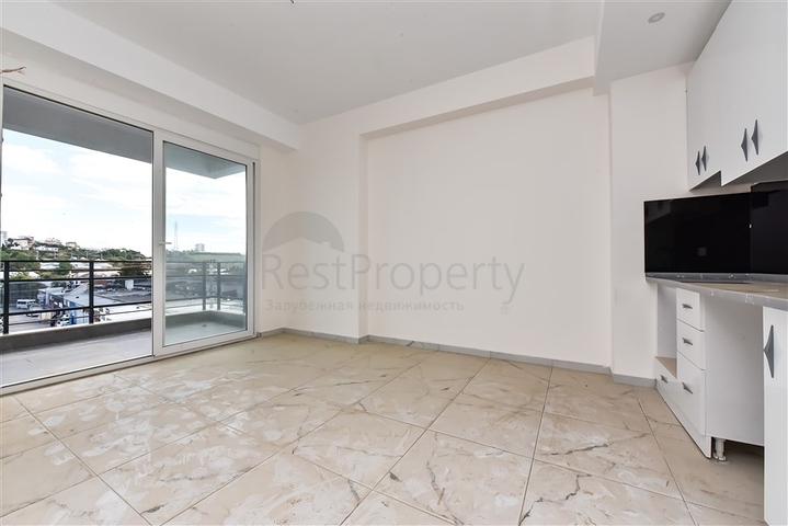 Двокімнатна квартира в новому будинку в районі Авсаллар