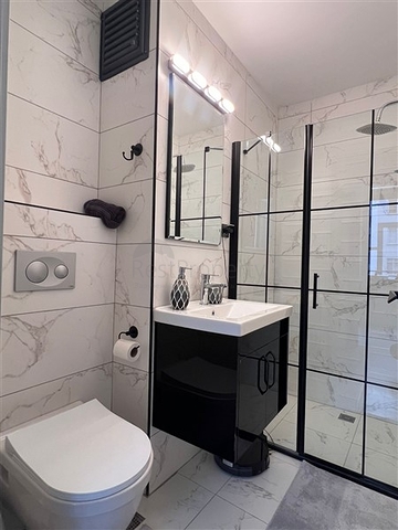 Квартира 2 + 1 в новому комплексі в районі Тедже в 400 метрах від моря