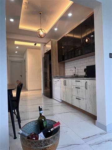 Квартира 2 + 1 в новому комплексі в районі Тедже в 400 метрах від моря