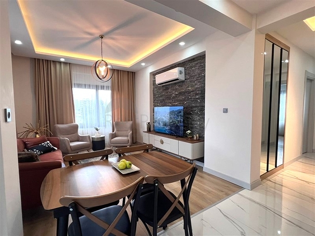 Квартира 2 + 1 в новому комплексі в районі Тедже в 400 метрах від моря