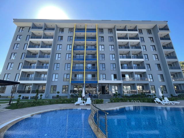 Мебльована трикімнатна квартира в новому будинку в районі Газіпаша