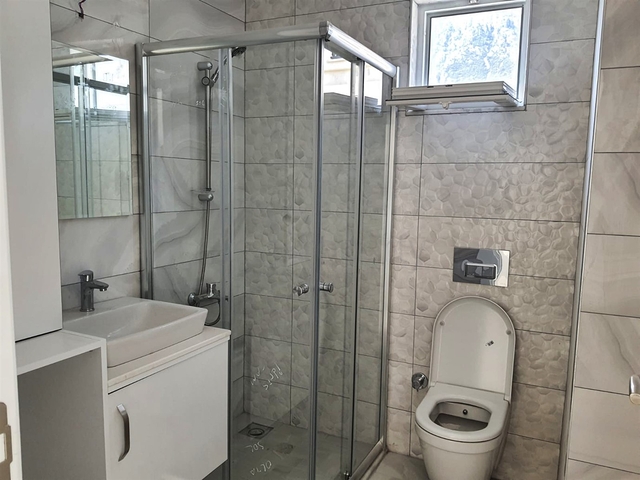 Квартира планування 3 + 1 в мікрорайоні Асланбуджак - Анталія 