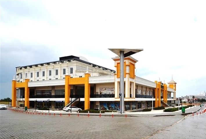 Комерційні приміщення в торговому центрі в районі Окурджалар 