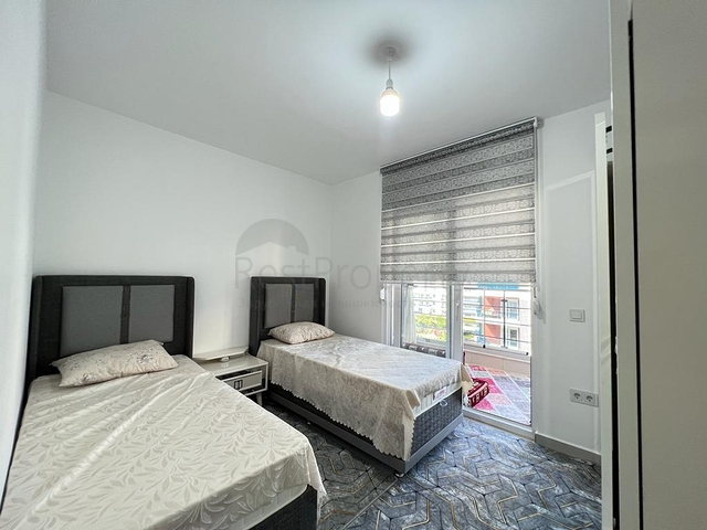 Мебльована трикімнатна квартира в Махмутларі 