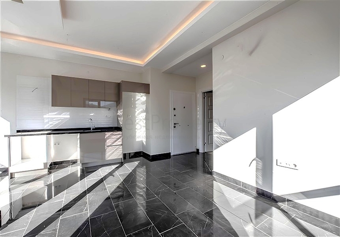 Квартира 1 + 1 в новому житловому комплексі району Махмутлар за вигідною ціною 