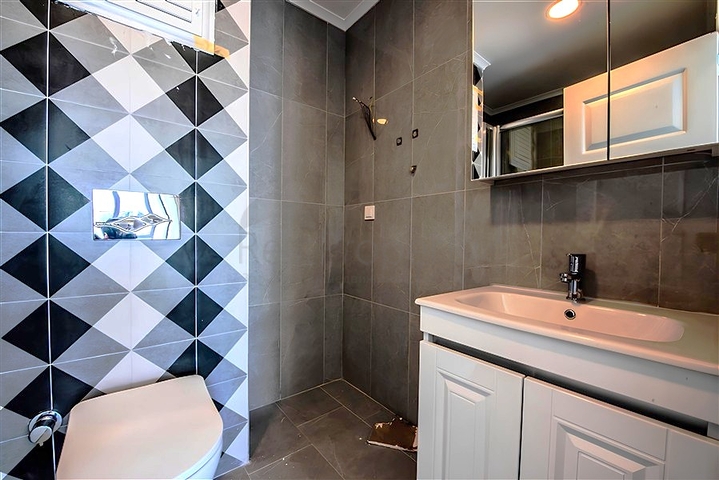 Квартира 1 + 1 в новому житловому комплексі району Махмутлар за вигідною ціною 