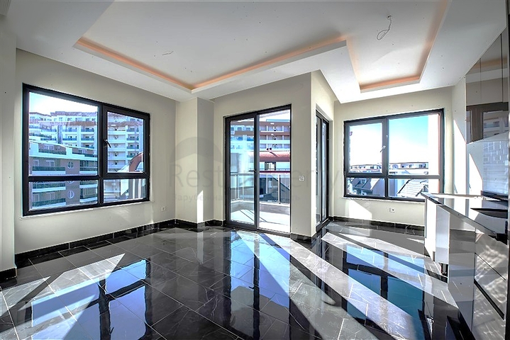 Квартира 1 + 1 в новому житловому комплексі району Махмутлар за вигідною ціною 