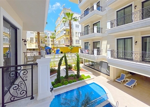 Стильна квартира 1 + 1 поруч з пляжем Клеопатра-комфорт в центрі Аланії