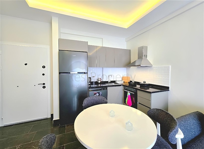 Сучасна квартира 1 + 1 в оренду-комфорт та інфраструктура в центрі Махмутлара